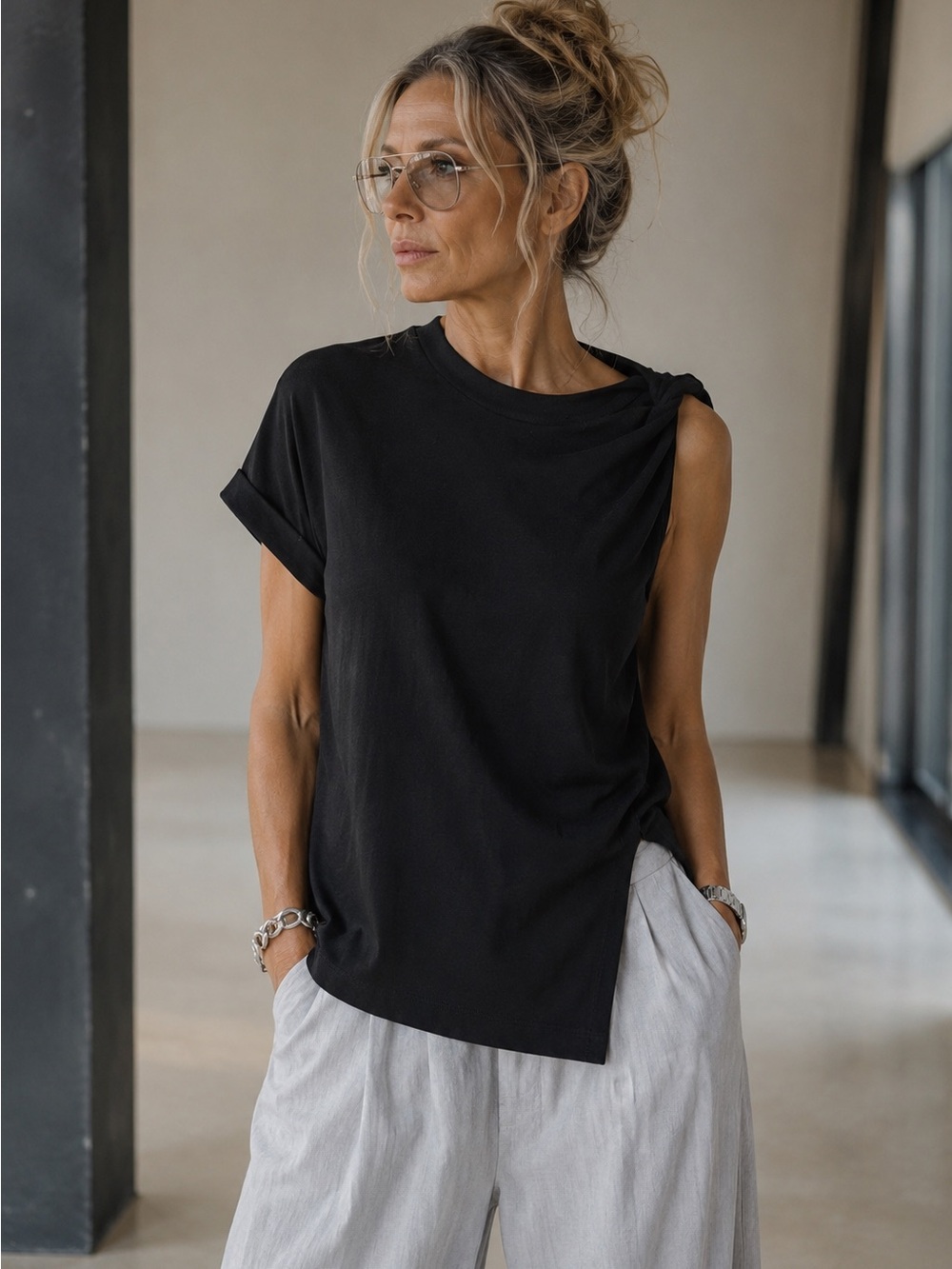 Clothes by locker room black asymmetrical shirt
